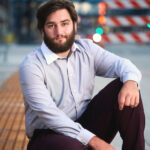 a man sitting on the ground