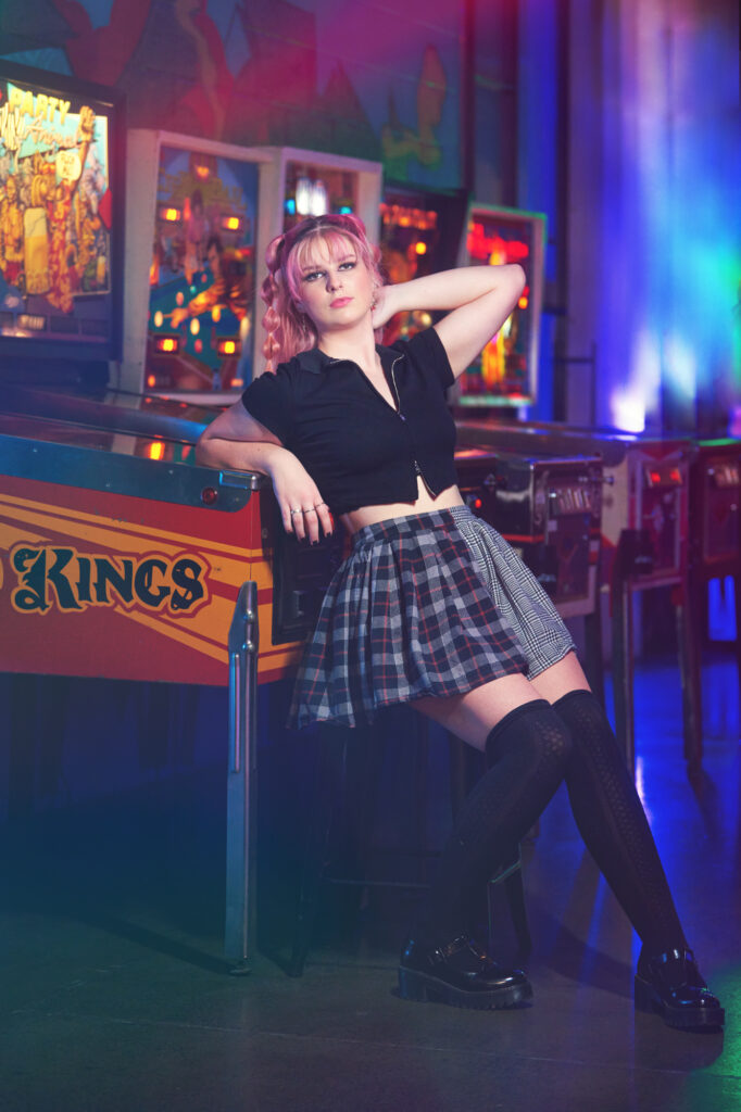 Creative Senior Picture Photographer in Vibrant Arcade Setting 33