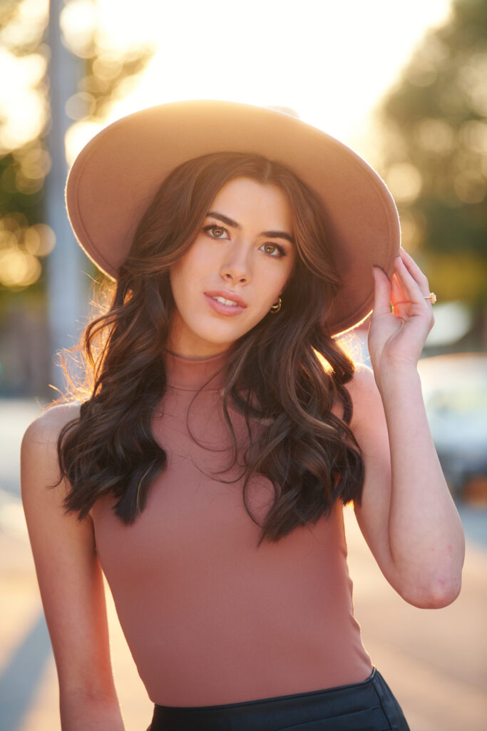 Elegant Senior Portrait with Hat by Experienced Photographer