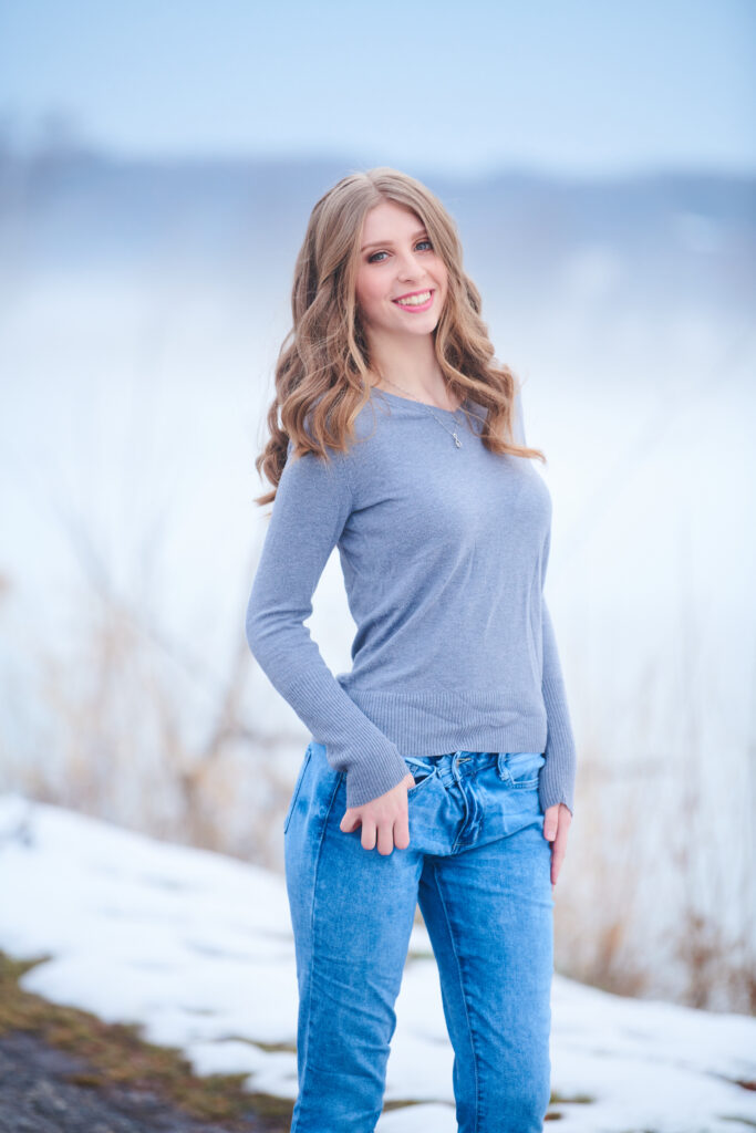senior portrait in the snow