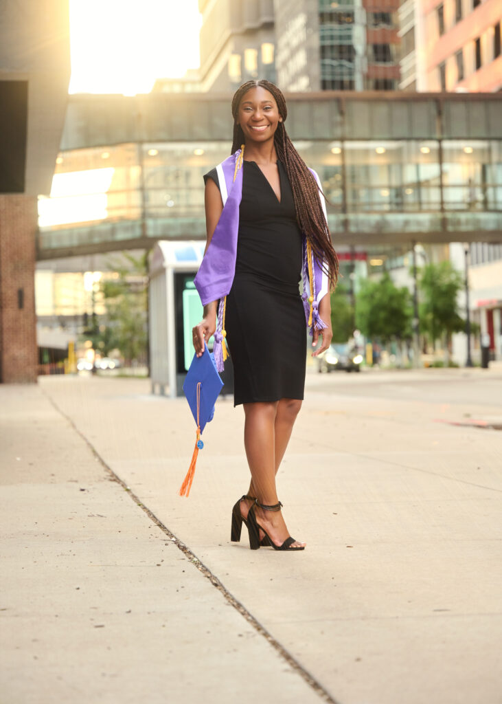 Photographer Captures Joyous Nursing School Graduate in Urban Setting