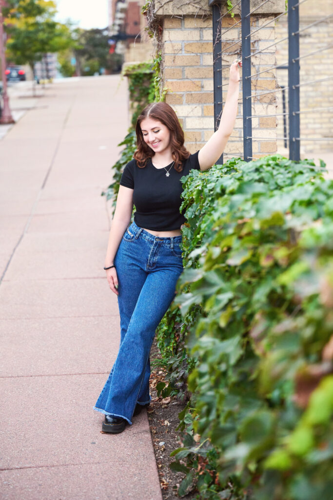 Urban High School Senior Portrait by Professional Photographer in Nature Setting