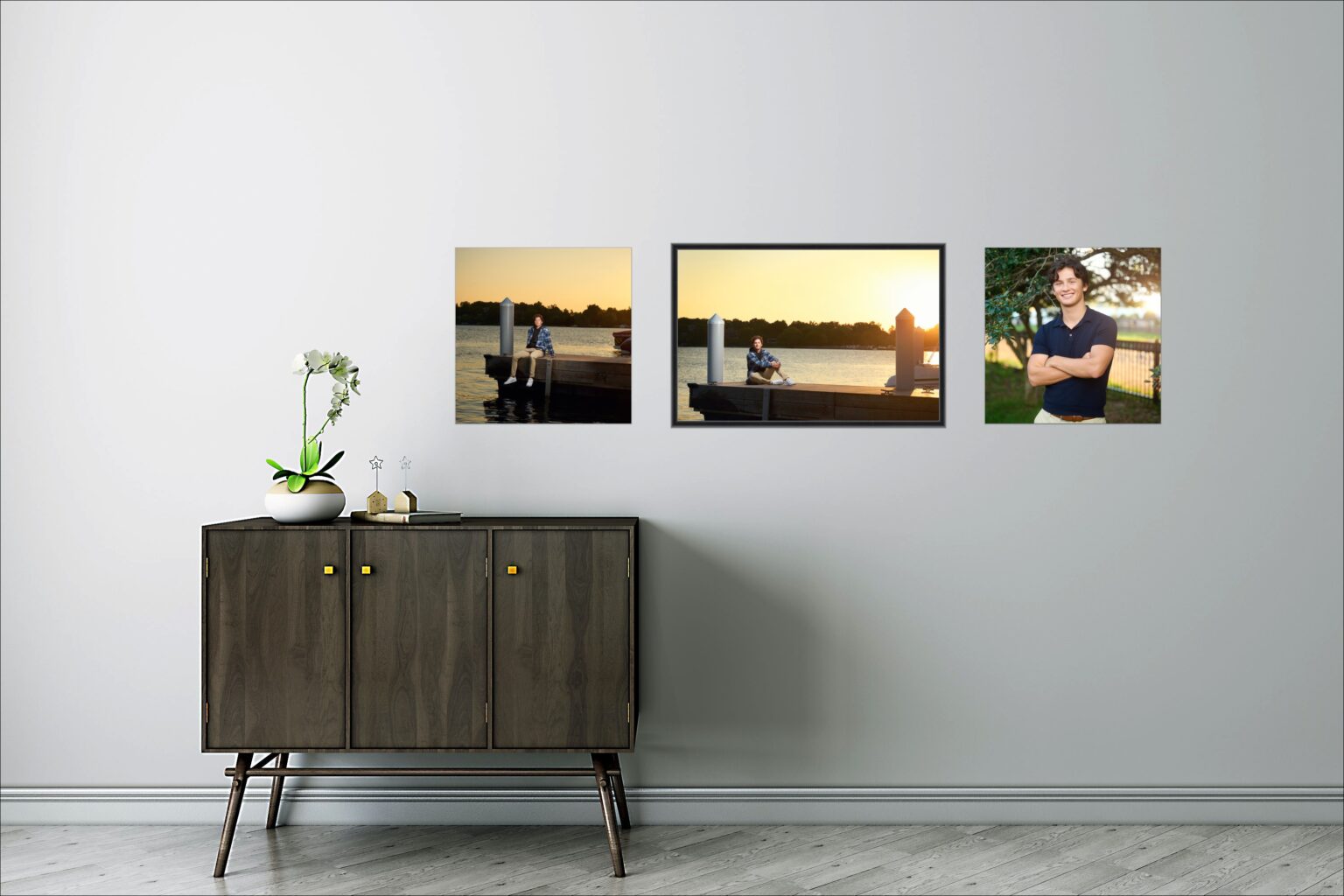 Room in client home with senior portraits on the wall framed